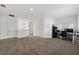 Spacious loft area with carpeted floor and workspace at 8370 Velda Trl, Sarasota, FL 34241