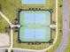 Aerial view of two pickleball and two tennis courts at 8370 Velda Trl, Sarasota, FL 34241