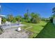 Spacious backyard with grassy area and patio at 2488 Breakwater Cir, Sarasota, FL 34231