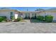 Neat and clean exterior of a light colored home with walkway at 2488 Breakwater Cir, Sarasota, FL 34231