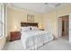 Spacious Primary bedroom with ample natural light and room for a king-size bed at 4951 Lakescene Pl, Sarasota, FL 34243