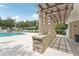 Outdoor shower and changing area near the pool at 4951 Lakescene Pl, Sarasota, FL 34243