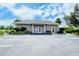 Community building with ample parking at 4072 Fairway Pl, North Port, FL 34287