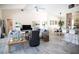Open and spacious living room with hardwood floors at 6772 Greenview Ln, Englewood, FL 34224