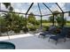 Spacious pool deck with lounge chairs, perfect for sunbathing at 6772 Greenview Ln, Englewood, FL 34224