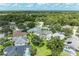 Aerial view showing home, pool, and surrounding neighborhood at 6519 Deerberry Ct, Lakewood Ranch, FL 34202