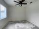 Empty bedroom with ceiling fan and window at 6519 Deerberry Ct, Lakewood Ranch, FL 34202