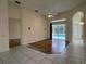 Gathering room with pool view and access to backyard at 6519 Deerberry Ct, Lakewood Ranch, FL 34202