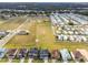 Aerial view of new homes and mobile homes at 12183 Stirrup Dr, Dade City, FL 33525