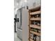 Stainless steel refrigerator and pull-out pantry shelves at 5333 Kelly Dr # 6, Sarasota, FL 34233