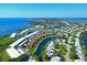 Aerial view of community with waterfront and lush landscaping at 4731 Independence Dr # 4731, Bradenton, FL 34210