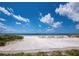 Private beach access with white sand and ocean views at 4825 Gulf Of Mexico Dr # 105, Longboat Key, FL 34228
