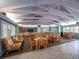 Spacious community room with high ceilings, comfortable seating, and tables at 4825 Gulf Of Mexico Dr # 105, Longboat Key, FL 34228