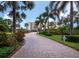 Brick driveway leading to beachfront condos at 4825 Gulf Of Mexico Dr # 105, Longboat Key, FL 34228