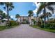 Brick driveway leading to beachfront building at 4825 Gulf Of Mexico Dr # 105, Longboat Key, FL 34228