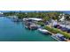 Aerial view of waterfront marina with boats and parking at 5732 Puccini St, Nokomis, FL 34275