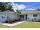 Newly built home with landscaped front yard and attached garage at 3800 Davis Blvd, Sarasota, FL 34232