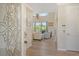 View from entryway into living room and hallway at 4931 Oxford Dr, Sarasota, FL 34242