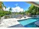 Stunning pool and patio overlooking the water at 4931 Oxford Dr, Sarasota, FL 34242