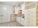 Large walk-in closet with ample shelving and drawers at 4931 Oxford Dr, Sarasota, FL 34242