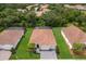 Aerial view of single-Gathering home with tile roof at 7291 Great Egret Blvd, Sarasota, FL 34241