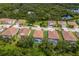 Aerial view of neighborhood with houses and green spaces at 7291 Great Egret Blvd, Sarasota, FL 34241