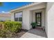 Inviting front entrance with modern door and landscaping at 7291 Great Egret Blvd, Sarasota, FL 34241