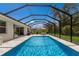 Screened-in pool with large patio area at 7291 Great Egret Blvd, Sarasota, FL 34241