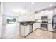 Modern kitchen with stainless steel appliances at 8106 Miramar Way, Lakewood Ranch, FL 34202