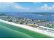 Aerial showing beachfront community and surrounding neighborhood at 1900 Gulf N Dr # 4, Bradenton Beach, FL 34217