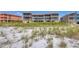 Building's rear view, beach access at 1900 Gulf N Dr # 4, Bradenton Beach, FL 34217