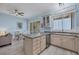 Bright kitchen with stainless steel appliances and light-colored cabinets at 1900 Gulf N Dr # 4, Bradenton Beach, FL 34217