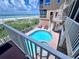 Community pool and spa with ocean views at 1900 Gulf N Dr # 4, Bradenton Beach, FL 34217