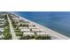 Coastal condo building with oceanfront views and beach access at 2810 N Beach Rd # 106, Englewood, FL 34223