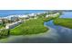 Condo building near water, lush vegetation, and beach at 4540 Gulf Of Mexico Dr # Ph1, Longboat Key, FL 34228