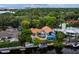 Aerial view of house, pool, and private dock at 1400 Quail Dr, Sarasota, FL 34231