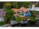 Aerial view of house, pool, and private dock at 1400 Quail Dr, Sarasota, FL 34231