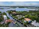 Aerial perspective of waterfront homes and the surrounding waterways at 1400 Quail Dr, Sarasota, FL 34231