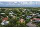 Aerial view of a waterfront community with lush greenery at 1400 Quail Dr, Sarasota, FL 34231