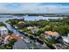 Aerial view of a home nestled in a waterfront community at 1400 Quail Dr, Sarasota, FL 34231