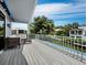 Spacious balcony with composite decking, offering water views at 1400 Quail Dr, Sarasota, FL 34231