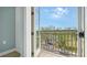 Private balcony overlooking a tree-lined street at 445 N Orange Ave # 309, Sarasota, FL 34236