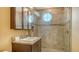 Bathroom with granite vanity and glass shower enclosure at 445 N Orange Ave # 309, Sarasota, FL 34236