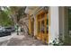 Retail space with wood-front doors and plants at 445 N Orange Ave # 309, Sarasota, FL 34236