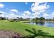 Community with lakefront homes and lush landscaping at 10622 Cheval Pl, Lakewood Ranch, FL 34202