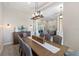 Bright dining room with view into Gathering room at 10622 Cheval Pl, Lakewood Ranch, FL 34202