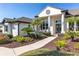 Elegant two-story home with manicured lawn and walkway at 10622 Cheval Pl, Lakewood Ranch, FL 34202