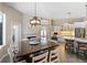 Kitchen with breakfast nook and white cabinets at 10622 Cheval Pl, Lakewood Ranch, FL 34202