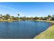 Scenic view of a tranquil lake in a residential community at 10622 Cheval Pl, Lakewood Ranch, FL 34202