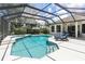 Resort-style pool and spa area with comfortable lounge chairs at 10622 Cheval Pl, Lakewood Ranch, FL 34202